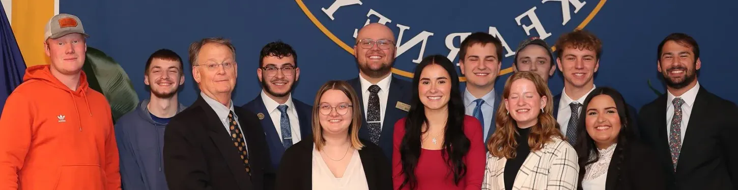 a group of student government members pose for a photo at inauguration  